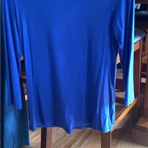 Talbots mid sleeve shirt with sun protection, has tie in back . Size small